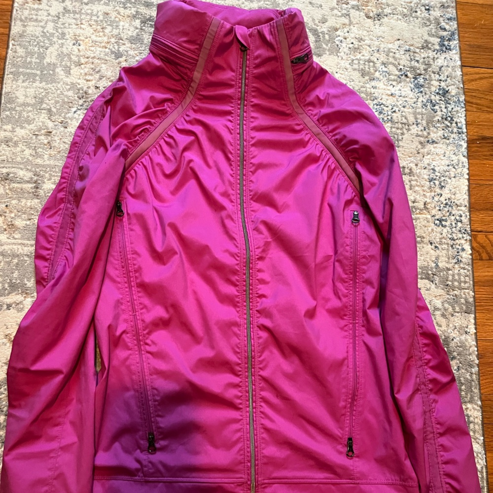 Lightweight Lululemon running jacket with hood.